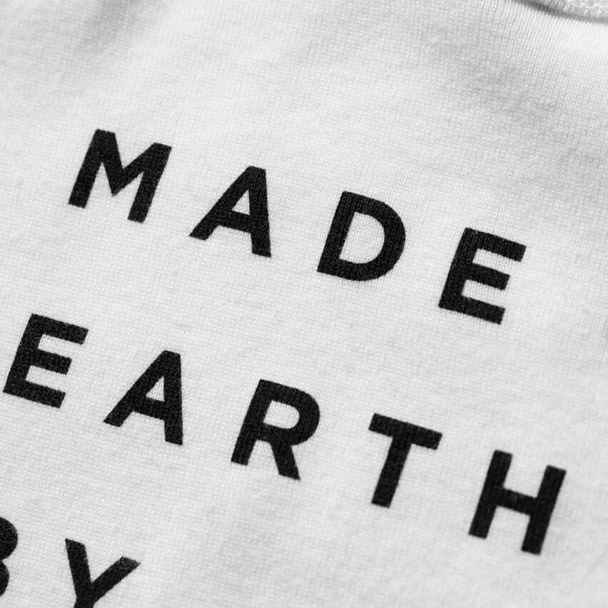 imagen product Made on Earth by Humans Onesie